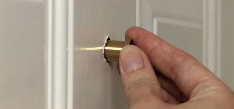 peephole door repair in Kendall West